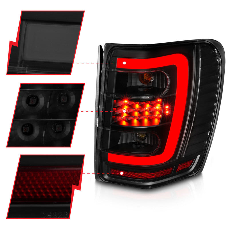 ANZO 1999-2004 Jeep Grand Cherokee LED Tail Lights w/ Light Bar Black Housing Smoke Lens 311395