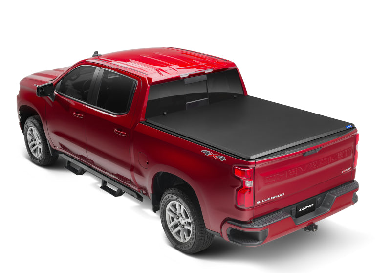 Lund 04-15 Nissan Titan (5.5ft. Bed) Hard Fold Tonneau Cover w/Bracket Kit - Black 969450