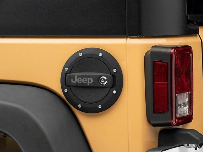 Officially Licensed Jeep 07-18 Jeep Wrangler JK Locking Fuel Door w/ Engraved Jeep Logo J157748