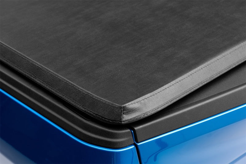 Lund 19-23 RAM 1500 (5.5ft Bed w/o RamBox Cargo Mgmt) Genesis Tri-Fold Tonneau Cover - Black 950165