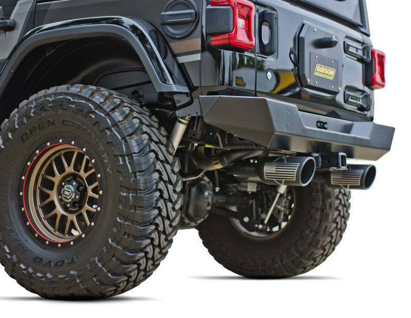 Gibson 12-17 Jeep Wrangler Sport 3.6L 2.5in Patriot Skull Series Cat-Back Dual Exhaust - Blk Ceramic 76-0023