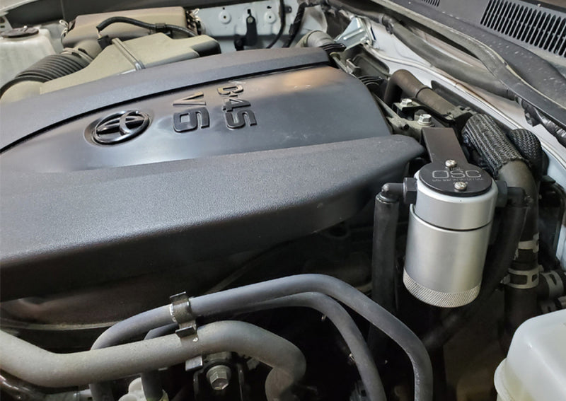 J&L 16-23 Toyota Tacoma 3.5L Driver Side Oil Separator 3.0 - Clear Anodized 3104D-C
