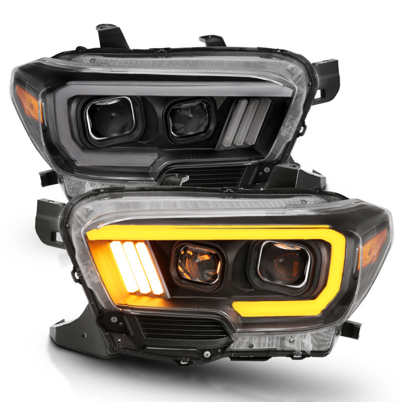 ANZO 2016-2017 Toyota Tacoma Projector Headlights w/ Plank Style Switchback Black w/ Amber 111396
