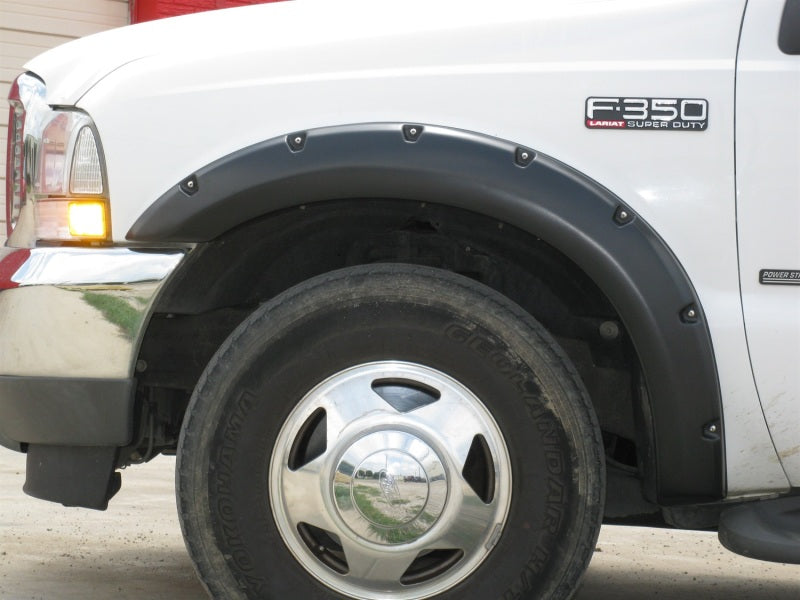 Lund 99-07 Ford F-250 RX-Rivet Style Textured Elite Series Fender Flares - Black (4 Pc.) RX311T