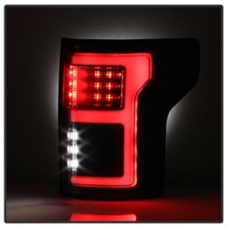 Spyder 15-18 Ford F-150 Light Bar LED Tail Lights (w/Blind Spot) - Black (ALT-YD-FF15015BS-LBLED-BK) 5085313