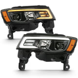 ANZO 2017-2018 Jeep Grand Cherokee Projector Headlights w/ Plank Style Switchback - Black w/ Amber 111418
