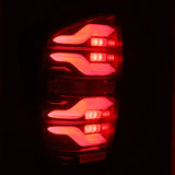 AlphaRex 16-21 Toyota Tacoma LUXX LED Taillights Blk/Red w/Activ Light/Seq Signal 680000