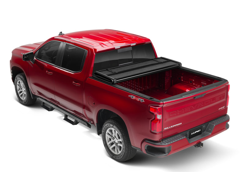 Lund 04-15 Nissan Titan (5.5ft. Bed) Hard Fold Tonneau Cover w/Bracket Kit - Black 969450
