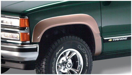Bushwacker 97-99 Chevy Tahoe OE Style Flares 4pc 4-Door Only - Black 40905-02