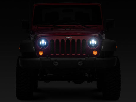 Raxiom 97-18 Jeep Wrangler TJ/JK Axial Series LED Daymaker Headlights- Black Housing (Clear Lens) J108042