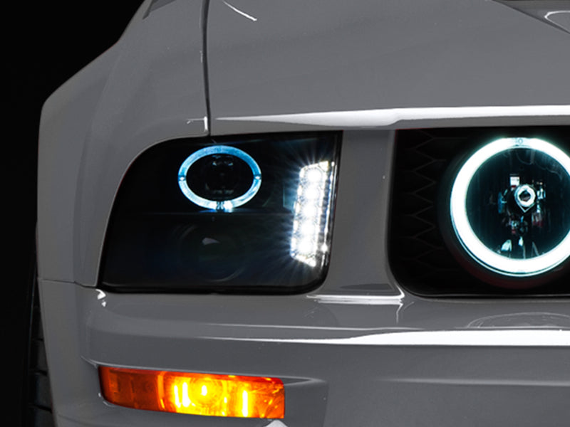 Raxiom 05-09 Ford Mustang w/ Halogen LED Halo Prjctr Headlights-Blk Hsng(Smoked Lens Exclude GT500) 49128