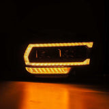 AlphaRex 19-21 Ram 2500 LUXX LED Proj Headlights Plank Style Alpha Blk w/Activ Light/Seq Signal/DRL 880549