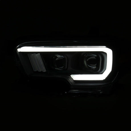 ANZO 2016-2017 Toyota Tacoma Projector Headlights w/ Plank Style Switchback Black w/ Amber w/ DRL 111397