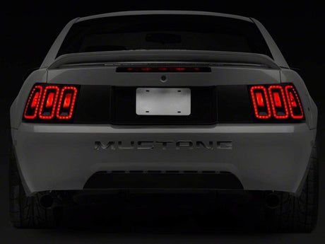 Raxiom 99-04 Ford Mustang Excluding 99-01 Cobra Icon LED Tail Lights- Black Housing (Smoked Lens) 100807