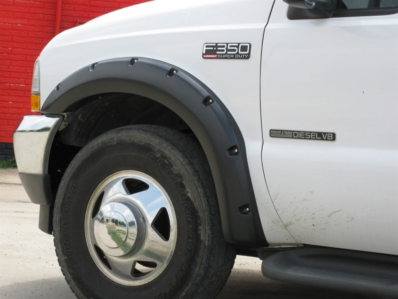 Lund 99-07 Ford F-250 RX-Rivet Style Textured Elite Series Fender Flares - Black (4 Pc.) RX311T