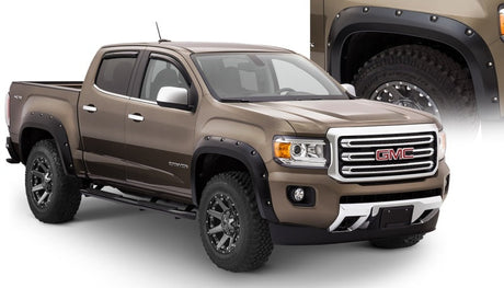 Bushwacker 15-18 GMC Canyon Pocket Style Flares 4pc 5ft Bed - Black 40971-02