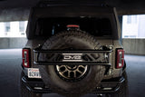 DV8 Offroad 21-23 Ford Bronco Spare Tire Guard & Accessory Mount TCBR-01