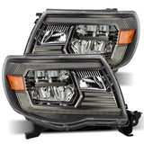 AlphaRex 05-11 Toyota Tacoma LUXX Crystal Headlights Plank Style Alpha Black w/Activation Light/DRL 880733