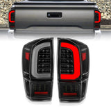 ANZO 16-21 Toyota Tacoma LED Tail Lights - w/ Light Bar Sequential Black Housing & Clear Lens 311400