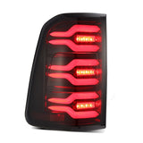 AlphaRex 19-21 Dodge Ram 1500 Luxx-Series LED Tail Lights Black/Red w/Activ Light/Seq Signal 640050