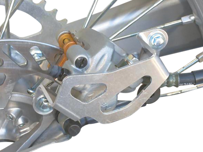 WORKS CONNECTION Rear Caliper Guard - RM125/250 25-015