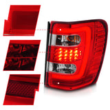 ANZO 1999-2004 Jeep Grand Cherokee LED Tail Lights w/ Light Bar Chrome Housing Red/Clear Lens 311396