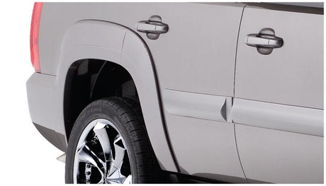 Bushwacker 07-11 GMC Yukon OE Style Flares 4pc Excludes Denali - Black 40922-02