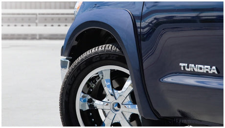 Bushwacker 07-13 Toyota Tundra Fleetside OE Style Flares 4pc w/ Factory Mudflap - Black 30909-02