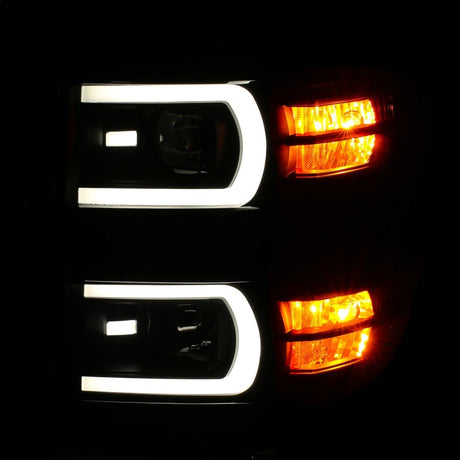 ANZO 14-15 Chevrolet Silverado 1500 Projector Headlights w/ Plank Style Switchback Black w/ Amber 111412
