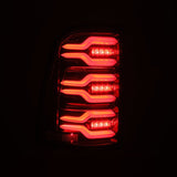 AlphaRex 19-21 Dodge Ram 1500 Luxx-Series LED Tail Lights Alpha-Black w/Activ Light/Seq Signal 640030