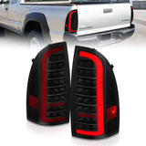 ANZO 05-15 Toyota Tacoma Full LED Tail Lights w/Light Bar Sequential Black Housing Smoke Lens 311428
