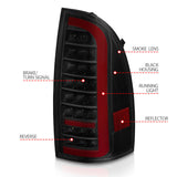 ANZO 05-15 Toyota Tacoma Full LED Tail Lights w/Light Bar Sequential Black Housing Smoke Lens 311428