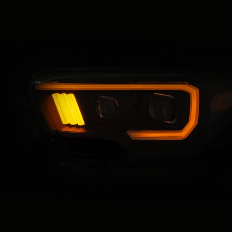ANZO 2016-2017 Toyota Tacoma Projector Headlights w/ Plank Style Switchback Black w/ Amber 111396