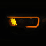 ANZO 2016-2017 Toyota Tacoma Projector Headlights w/ Plank Style Switchback Black w/ Amber w/ DRL 111397