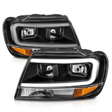 ANZO 99-04 Jeep Grand Cherokee Crystal Headlights - w/ Light Bar Black Housing 111537