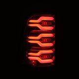 AlphaRex 19-21 Dodge Ram 1500 Luxx-Series LED Tail Lights Alpha-Black w/Activ Light/Seq Signal 640030