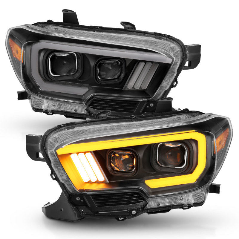 ANZO 2016-2017 Toyota Tacoma Projector Headlights w/ Plank Style Switchback Black w/ Amber w/ DRL 111397