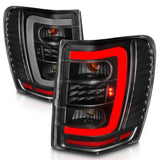 ANZO 1999-2004 Jeep Grand Cherokee LED Tail Lights w/ Light Bar Black Housing Clear Lens 311394