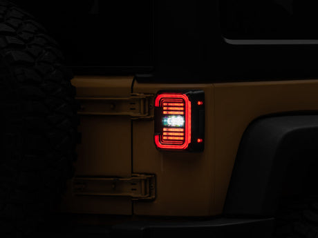 Raxiom 07-18 Jeep Wrangler JK Axial Series LED Halo Tail Lights- Black Housing (Dark Smoked Lens) J138358